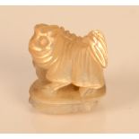 A mother of pearl pekingese dog, height 2.4cm.