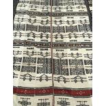 Two Mali wedding blankets, each with horizontal bands with geometric motifs,
