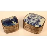 Two Chinese silver coloured metal boxes, each with blue and white porcelain insets to the covers,