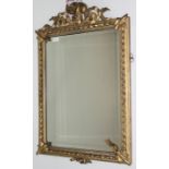 A giltwood wall mirror, 19th century, height 88cm, width 54cm.