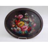 A tole peinte oval tray, painted with flowers and signed M.Ciuiceh?, 40.5 x 50.5cm.