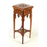 A small oak plant stand, early 20th century, height 46cm, width 17cm, depth 17cm.