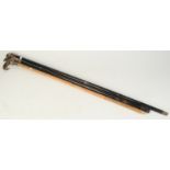A swagger stick, the finial with CLI crowned monogram, together with a walking cane,