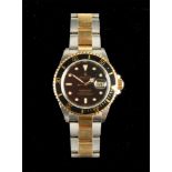 A Rolex Submariner 18ct gold and stainless steel black Oyster Perpetual Date wristwatch, no.