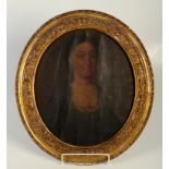 A Victorian portrait of a lady, oil on canvas laid to board, reduced, 36 x 31cm.