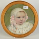 A circular portrait of a baby, watercolour, in a giltwood frame, glazed, diameter 24cm.