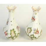 A pair of Chelsea fluted baluster vases, circa 1760, enamelled with butterflies, insects,