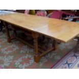 An oak draw leaf refectory table, 20th century, height 76cm, length fully extended 265cm,