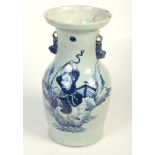 A Chinese celadon vase, 19th century, decorated with a boy and a toad, height 35cm.