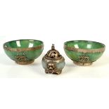 A pair of Chinese jadeite and white metal mounted bowls, character marks to base, height 5cm,