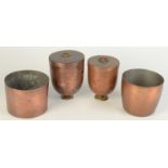 Two cylindrical copper pans and two copper lidded jelly moulds, each with detachable brass foot.