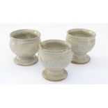Three egg cups With Cross Pottery impressed marks