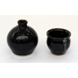 A small tenmoku glazed Leach Pottery bottle vase Leach Pottery impressed marks Height of vase 7.