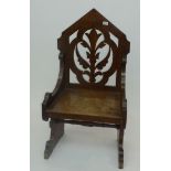 A mahogany hall chair, in the manner of Dresser, circa 1880,
