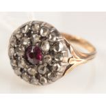 A high purity gold, rose cut diamond and ruby target cluster ring, Collingwood box.