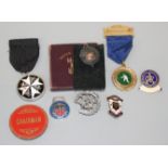 A 1951 Crown boxed, various medals and badges.