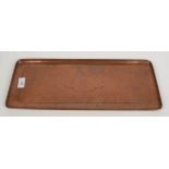 A hammered copper rectangular tray, impressed 'Newlyn', 47.5 x 19.5cm.