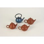 A small Chinese Yixing teapot, with calligraphy around the body, height 6cm, length 10cm,