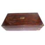 A rosewood and brass bound writing slope, early 19th century, height 14cm, width 50cm, depth 25cm.