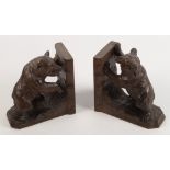 A pair of Black Forest carved wood bear bookends, 20th century, each height 18.5, width 18.