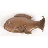 A Japanese bronze model of a carp, 4 x 8cm.