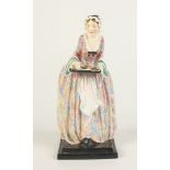 A rare Royal Doulton figure M'Lady's Maid, HN1822, height 23cm.