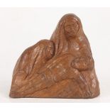 A carved wooden sculpture depicting a 'Pieta' (the virgin Mary cradling the body of Jesus), 1920s,