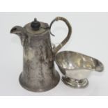 A silver Walker & Hall coffee pot, Sheffield 1923, together with a silver cream jug.