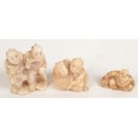 Three Japanese ivory netsukes, each signed, heights 4.7cm, 3.5cm and 2cm.