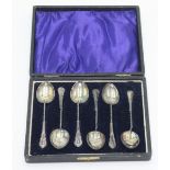 A set of six silver coffee spoons, cased.