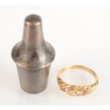 A rare late 18th or early 19th century engraved silver small perfume bottle and an 18ct gold ring