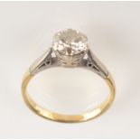 An 18ct yellow gold solitaire diamond ring, the stone of approximately 0.75ct spread.