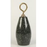 A Cornish serpentine door stop, with brass loop handle, height 28.5cm, width 11cm.