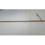 A steel bladed sword stick, concealed as a wooden walking cane, full length 89cm,