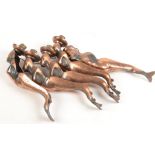 A set of five copper coated metal wall lights, in the form of mermaids, length 32cm.