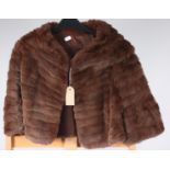 A chocolate brown fur bolero jacket, length 41cm, size 8/10.