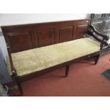 A George III walnut settle, the back with four fielded panels.