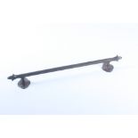 A cast iron door handle, length 48.5cm, width 7.2cm, depth 5.5cm.