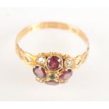 A Victorian 15ct gold ring with a garnet, ruby and diamond cluster, Birmingham 1869.
