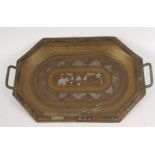 An Indian brass twin handled tray, circa 1900, with silver and copper inlay, 35.2 x 55.5cm.