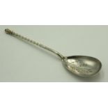 A continental silver spoon with twisted stem and urn finial,