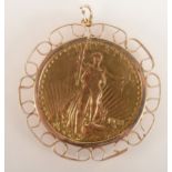 An American gold double eagle 20 dollar coin 1928 in loose pendant gold mount, 39.2g.