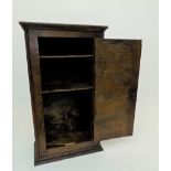 A rare 17th century oak joined Mural cupboard,