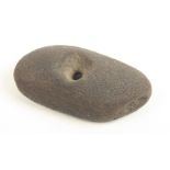 A medieval stone fishing weight, 416.9g, 11.9cm in length, 6.