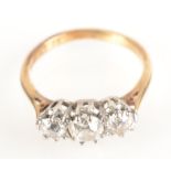 A 9ct gold ring set three diamonds.