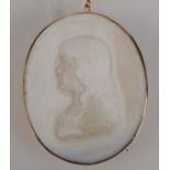 A gold mounted, Tassie type, white glass portrait of a child, named on the truncation Agn.