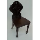 An early Victorian mahogany hall chair,