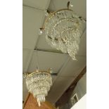 A pair of gilt metal and cut glass waterfall chandeliers, height 34cm.