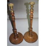 A large pair of French walnut candlesticks, with gilt metal sconces, height 57cm,
