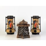 A cast iron hexagonal lantern, height 23cm and a pair of Embosa ware vases.
